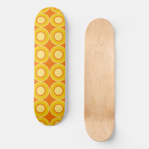 Yellow Orange Donuts With Filling On Burnt Orange Skateboard