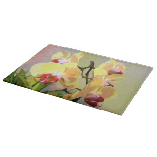 Yellow Orchids in the afternoon sun Cutting Board