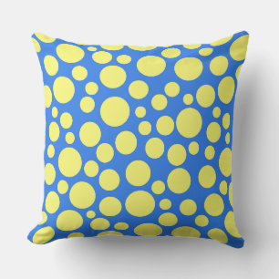 Yellow peas on a sky blue background outdoor pillow