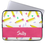 Yellow pencils and scrabbles on white laptop sleeve