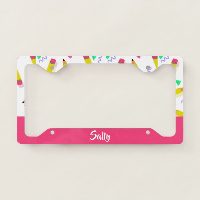 Yellow pencils and scrabbles on white license plate frame (Front)