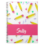 Yellow pencils and scrabbles on white notebook
