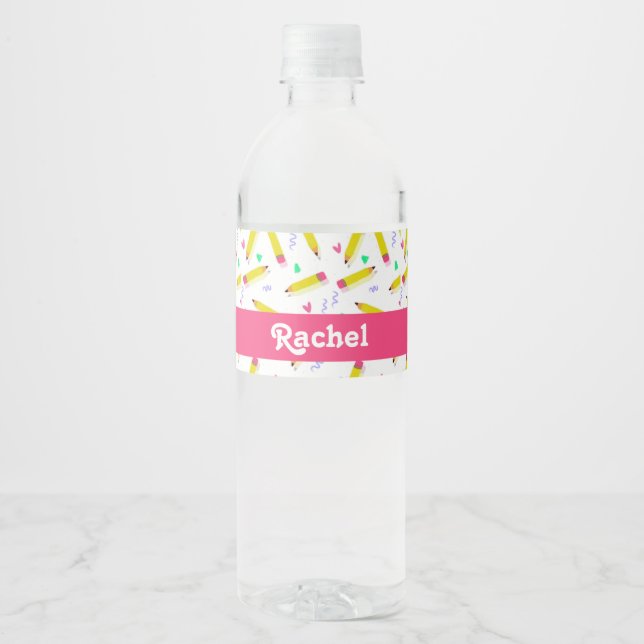 Yellow pencils and scrabbles on white water bottle label (Front)