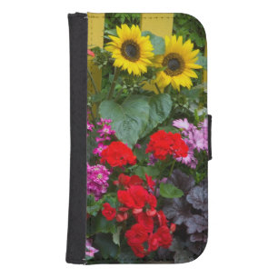 Yellow picket fence with flower garden in wallet phone case for samsung galaxy s4