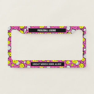 Yellow pickleballs on pink license plate frame