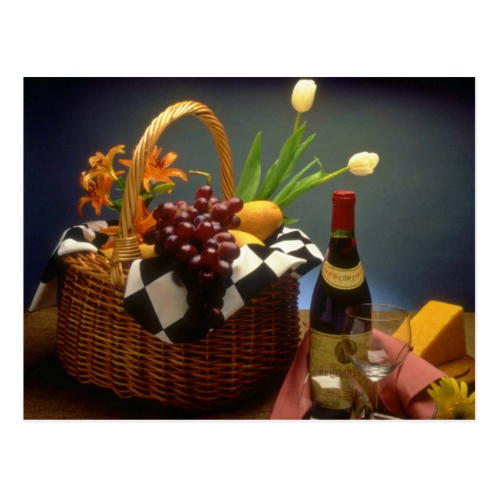 Yellow Picnic basket with wine, cheese, bread and Post Card