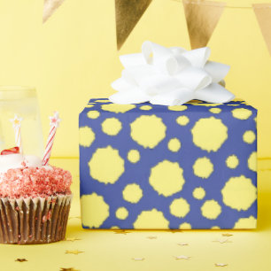 Yellow polka dots on blue wrapping paper