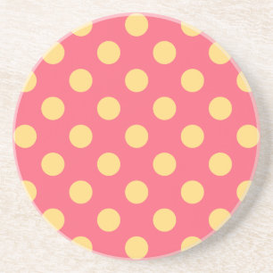 Yellow polka dots on coral drink coaster