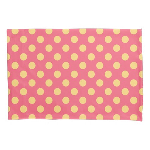 Yellow polka dots on coral pillowcase