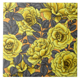 Yellow roses with gray leaves on orange ceramic tile