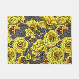 Yellow roses with gray leaves on orange doormat