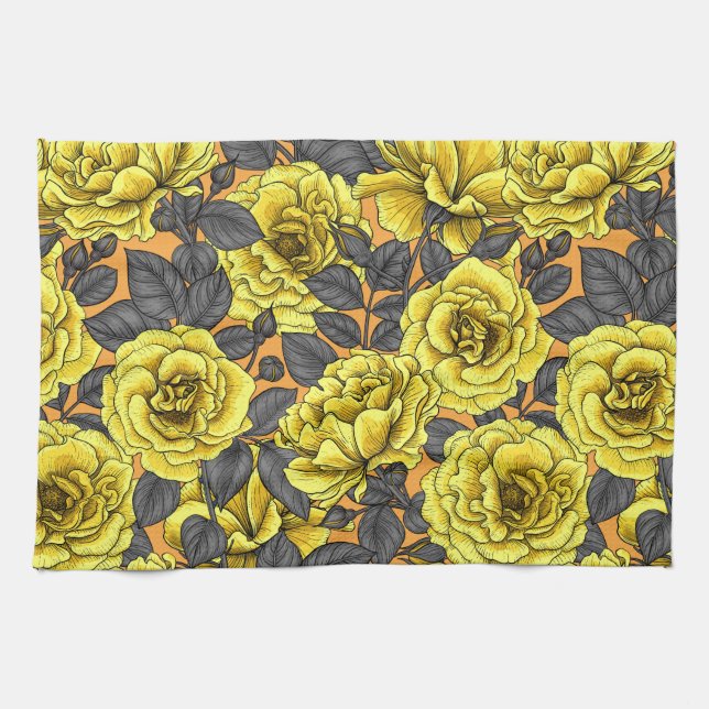 Yellow roses with gray leaves on orange kitchen towel (Horizontal)