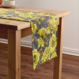 Yellow roses with gray leaves on orange short table runner
