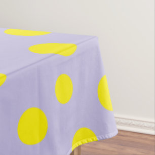 Yellow round polka dots on gray tablecloth