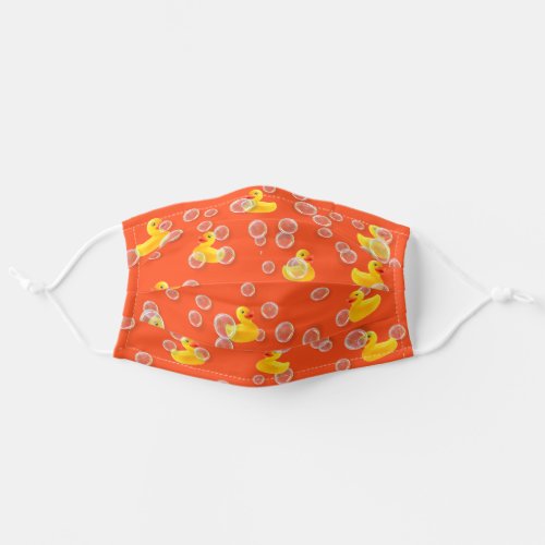 Yellow rubber ducks and bubbles on orange adult cloth face mask