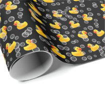 Yellow rubber ducks in bubbles wrapping paper