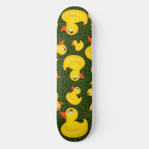 Yellow Rubber Ducks on Green Grass Skateboard Deck