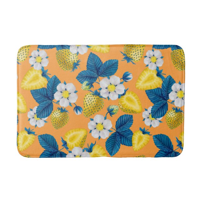 Yellow strawberries on orange bath mat (Front)