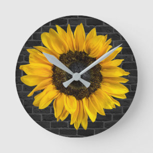 yellow sunflower on brick wall round clock