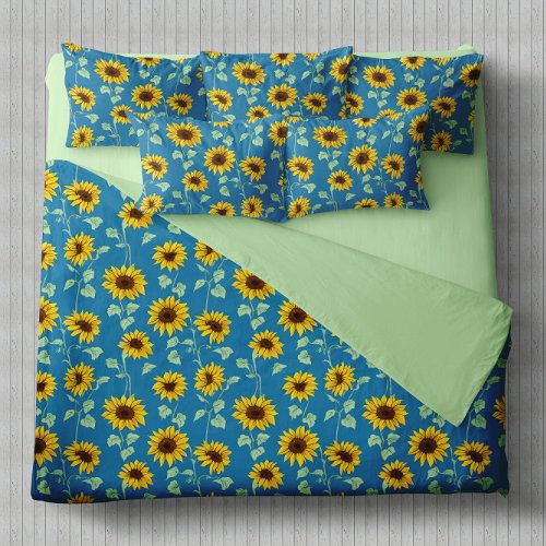 Yellow sunflowers green leaves blue background duvet cover