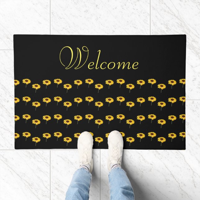 Yellow sunflowers on black doormat (Indoor)