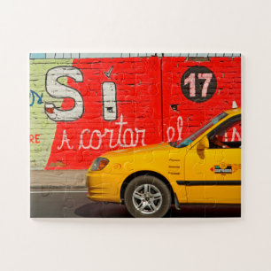 Yellow taxi & graffiti, Ecuador Jigsaw Puzzle