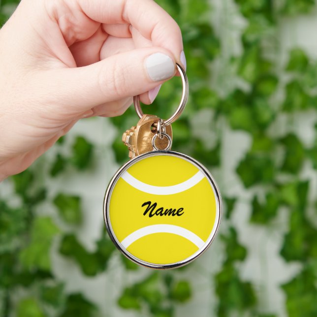 Yellow tennis ball keychain with custom name (Hand)