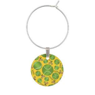 Yellow tennis balls rackets and nets wine glass charm