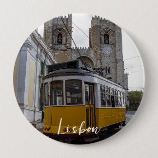 Yellow tram on Lisbon Cathedral in Portugal Button