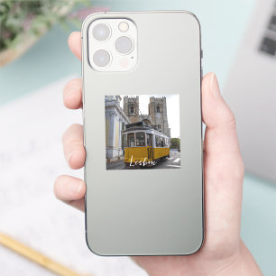 Yellow tram on Lisbon Cathedral in Portugal Sticker