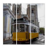Yellow tram on Lisbon Cathedral in Portugal