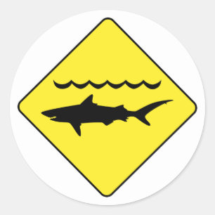 Yellow 'warning sharks' sign classic round sticker