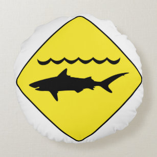 Yellow 'warning sharks' sign round pillow