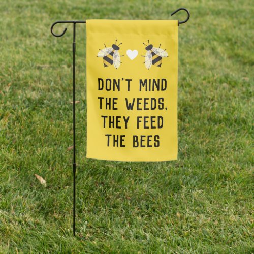 Don't mind the weeds. They feed the bees. Garden sign.