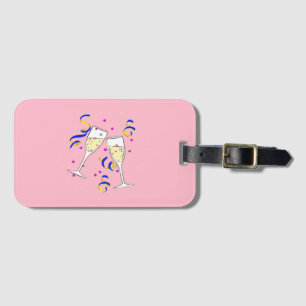 yellow wine on pink luggage tag
