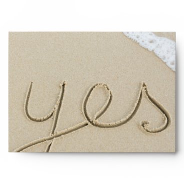 Yes carved word on the beach sand envelope Yes carved word on the beach sand envelope