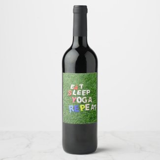 Yoga eat sleep golf repeat on green grass wine label