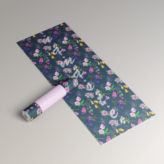 Yoga for women with delicate flowers on blue yoga mat (Creator Uploaded)