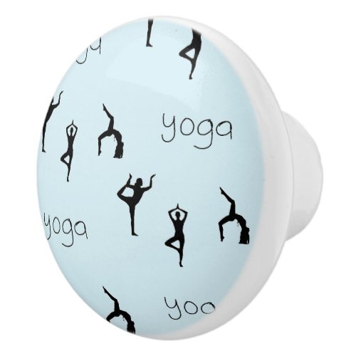 Yoga poses and text pattern on blue ceramic knob