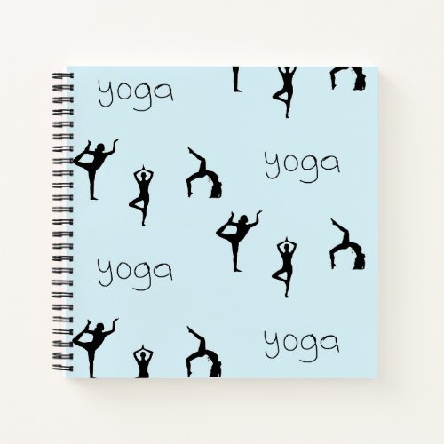 Yoga poses and text pattern on blue notebook