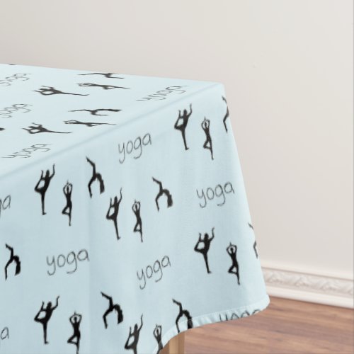 yoga poses on blue tablecloth