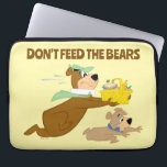 Yogi Bear and Boo-Boo Picnic Panic Laptop Sleeve<br><div class="desc">Yogi Bear is on the run again with another picnic basket in this fun and energetic design! Featuring Yogi dashing away with his prize while Boo Boo looks on in distress, this hilarious artwork perfectly captures the classic mischief of Jellystone Park’s favorite bear. With bold colors, dynamic movement, and a...</div>