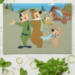 Yogi Bear and Friends Warm Welcome Kitchen Towel<br><div class="desc">Celebrate friendship and fun with this heartwarming Yogi Bear group artwork! Featuring Yogi Bear, Boo Boo, Cindy Bear, and Ranger Smith in a joyful embrace, this illustration perfectly captures the cheerful spirit of Jellystone Park. With vibrant colors and a nostalgic retro animation style, this design is perfect for fans of...</div>