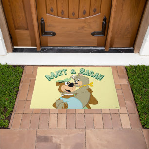 Yogi Bear Carrying Cindy Bear Doormat