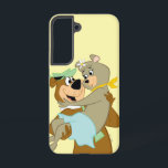 Yogi Bear Carrying Cindy Bear Samsung Galaxy S22 Case<br><div class="desc">Celebrate love and friendship with this adorable Yogi Bear and Cindy Bear design! Featuring Yogi lifting Cindy in a sweet and playful pose, this heartwarming artwork captures their charming romance and classic cartoon fun. With vibrant colors and a retro animation style, this nostalgic design is perfect for fans of Jellystone...</div>