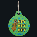 Yogi Bear Hey Hey Hey Pet ID Tag<br><div class="desc">Bring the energy of Jellystone Park to life with this bold and fun Yogi Bear design! Featuring Yogi in a confident pose alongside his signature catchphrase "Hey Hey Hey, " this artwork pops with a vibrant green polka dot background and striking yellow text. Capturing the retro animation style and playful...</div>