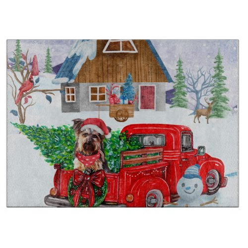 Yorkshire Terrier Dog In Christmas Delivery Truck Cutting Board