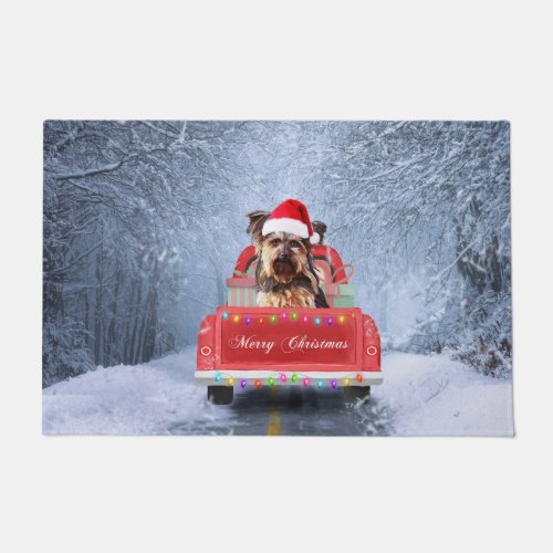 Yorkshire Terrier Dog in Snow sitting in Christmas Doormat