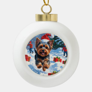 Yorkshire Terrier in Snow with Christmas Hat Ceramic Ball Christmas Ornament