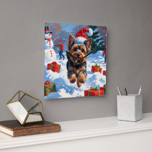 Yorkshire Terrier in Snow with Christmas Hat Square Wall Clock
